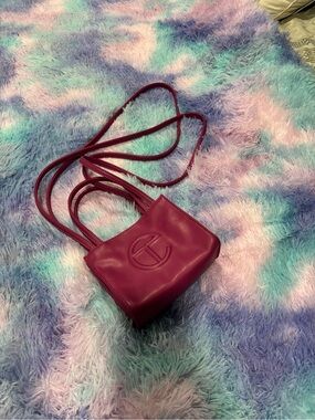 Magenta Leather Crossbody Bag with Embossed Logo